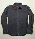 Tommy Hilfiger navy button-down shirt with white star pattern and embroidered flag logo.