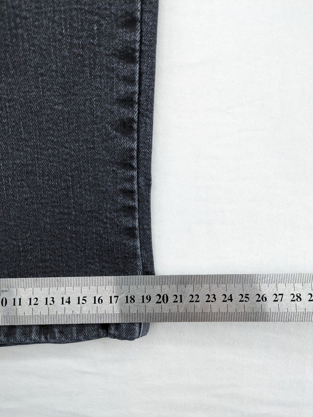 Arizona grey straight jeans with pearl-embellished wing appliqué on back pocket.