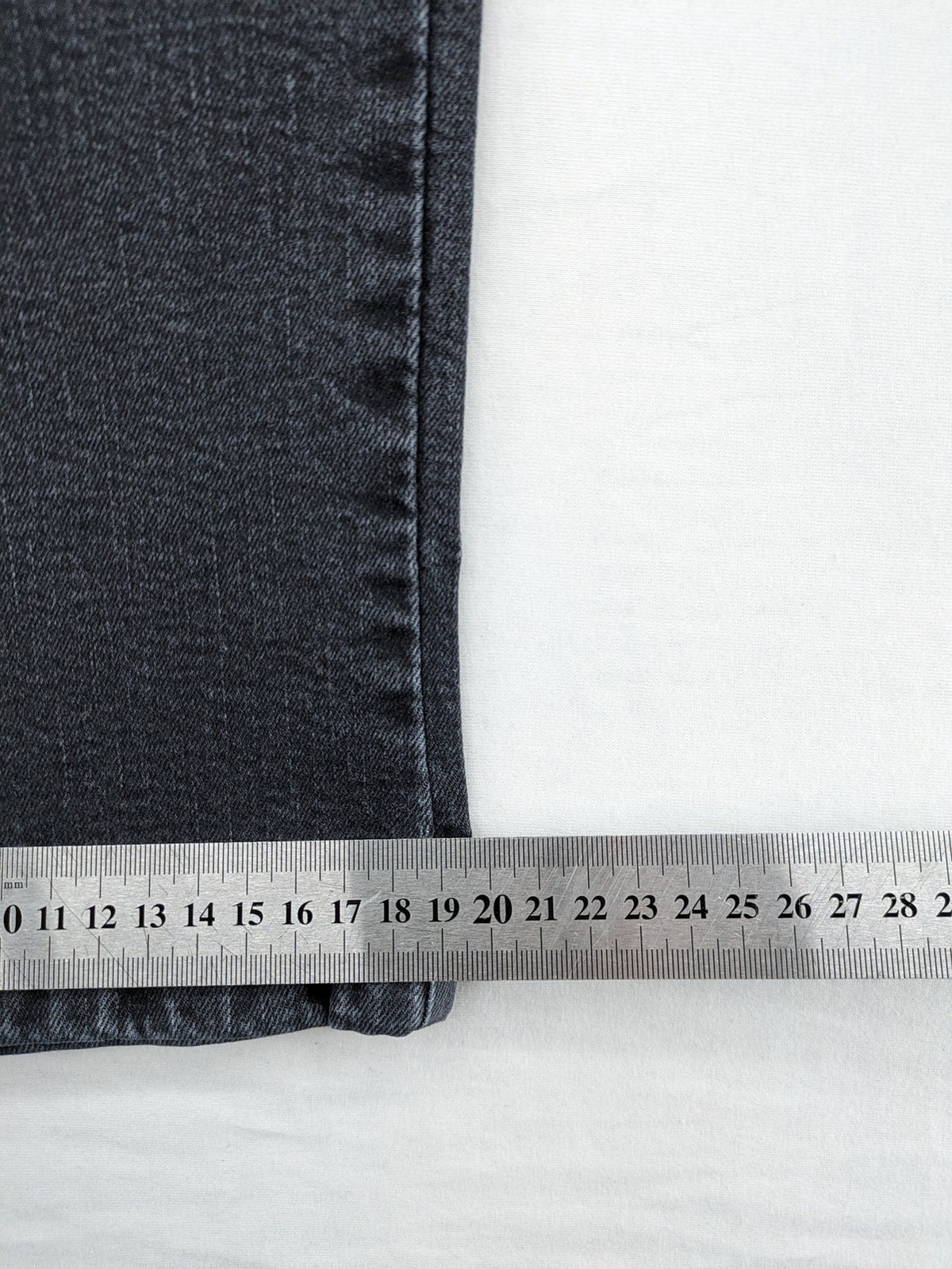 Arizona grey straight jeans with pearl-embellished wing appliqué on back pocket.