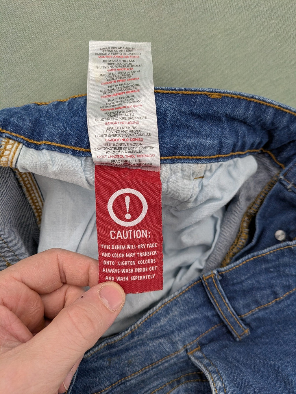 Bench blue straight jeans with reinforced knees and multiple cargo pockets.