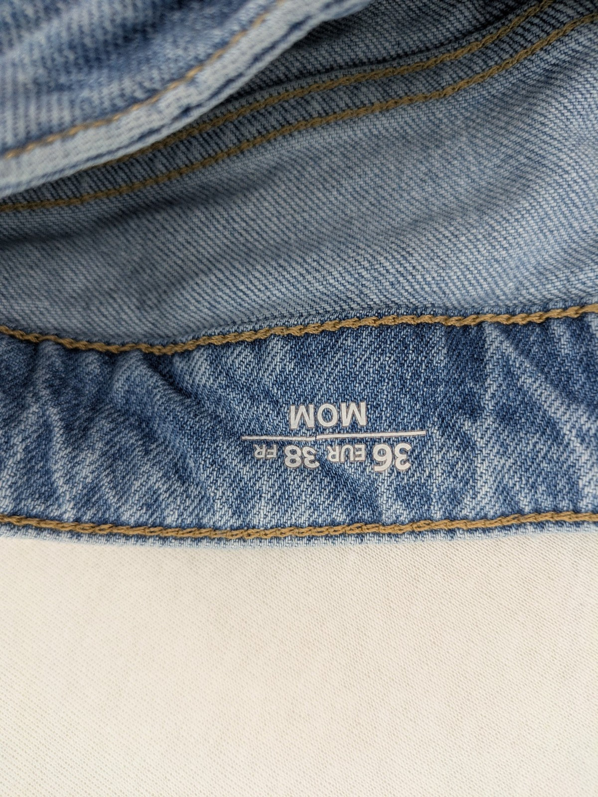 C&A blue mom jeans high waist with unique patchwork design and soft stretch denim.