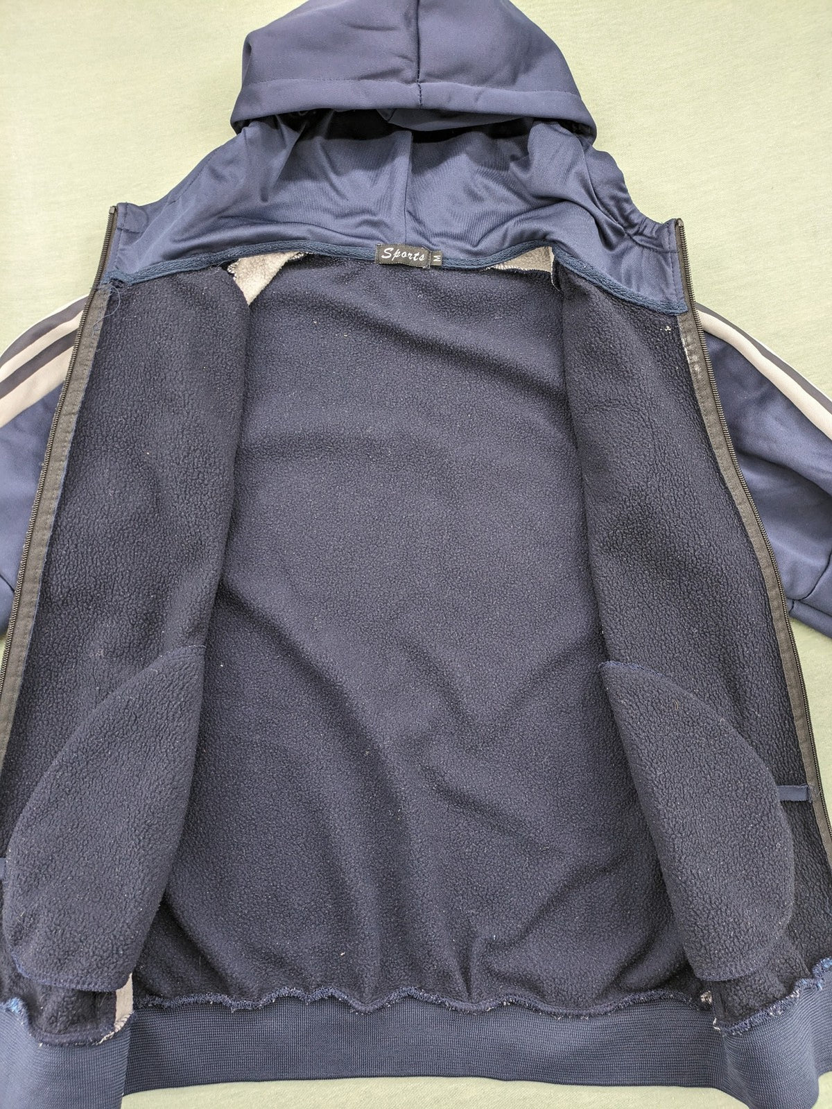 Chelsea FC grey and navy tracksuit set with full zip hoodie and three logos.
