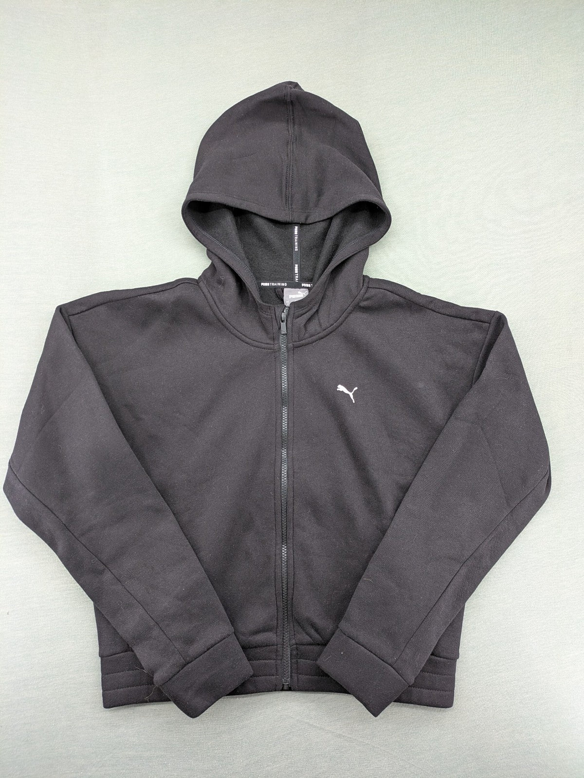 Puma grey zip-through hoodie with iconic logo and two practical pockets.
