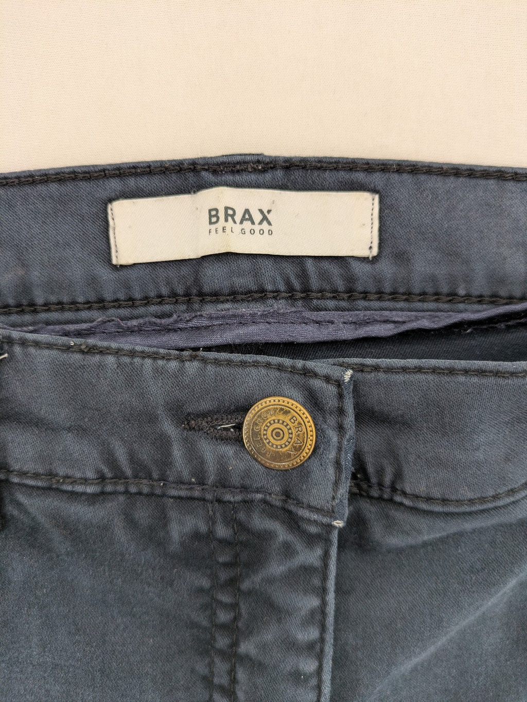 BRAX blue straight leg jeans with "Mary" fit, soft stretch fabric, and washed finish.