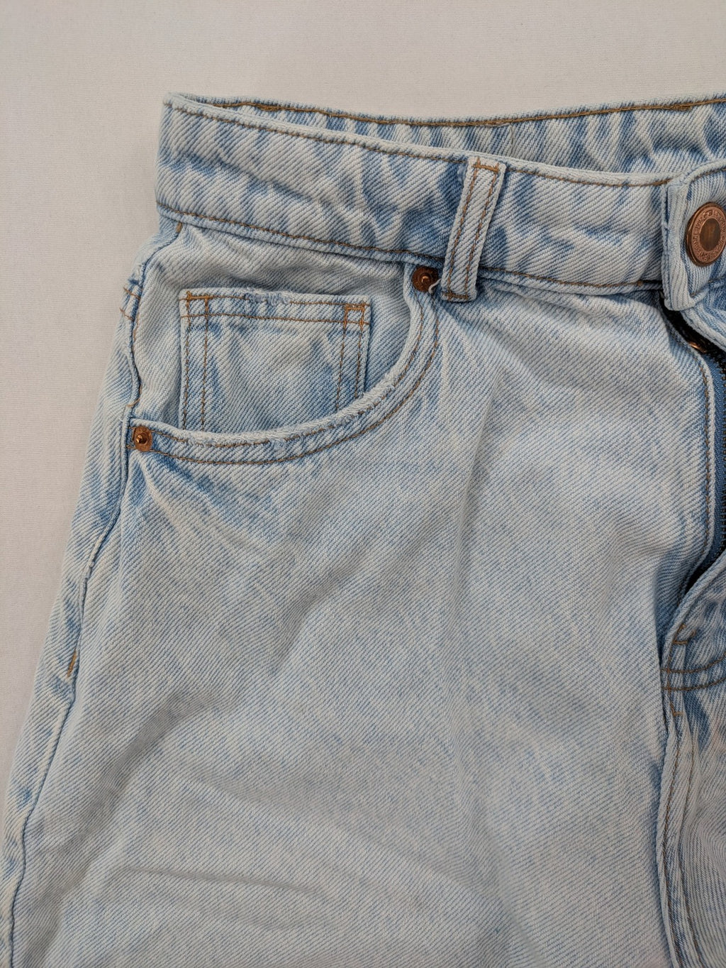 FB Sister blue mom jeans high waist distressed denim with knee rips and classic fit.