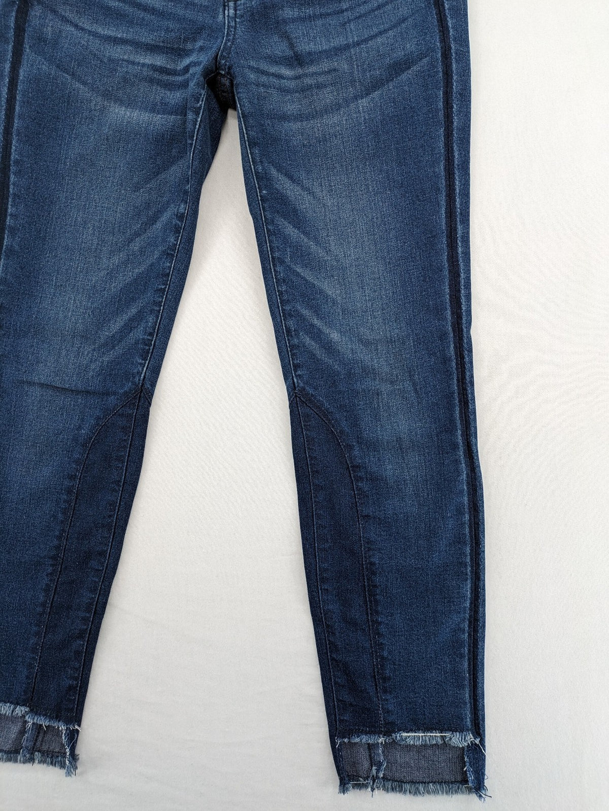 Best Connections blue skinny jeans with frayed hem and sporty side stripe.