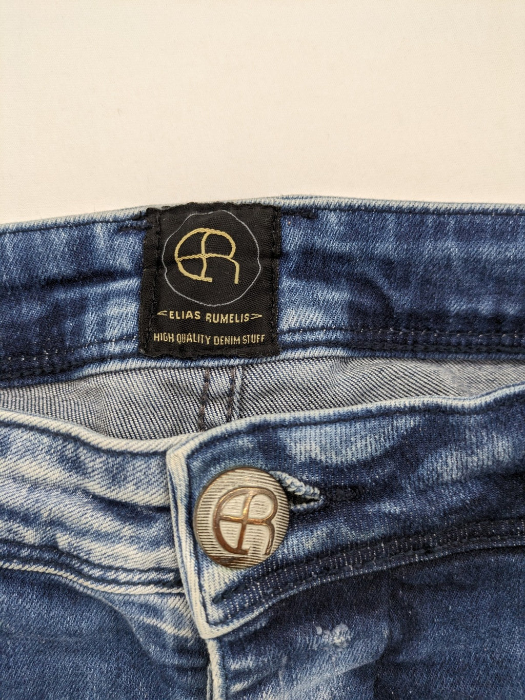 W32 blue straight jeans distressed details tapered fit button fly design