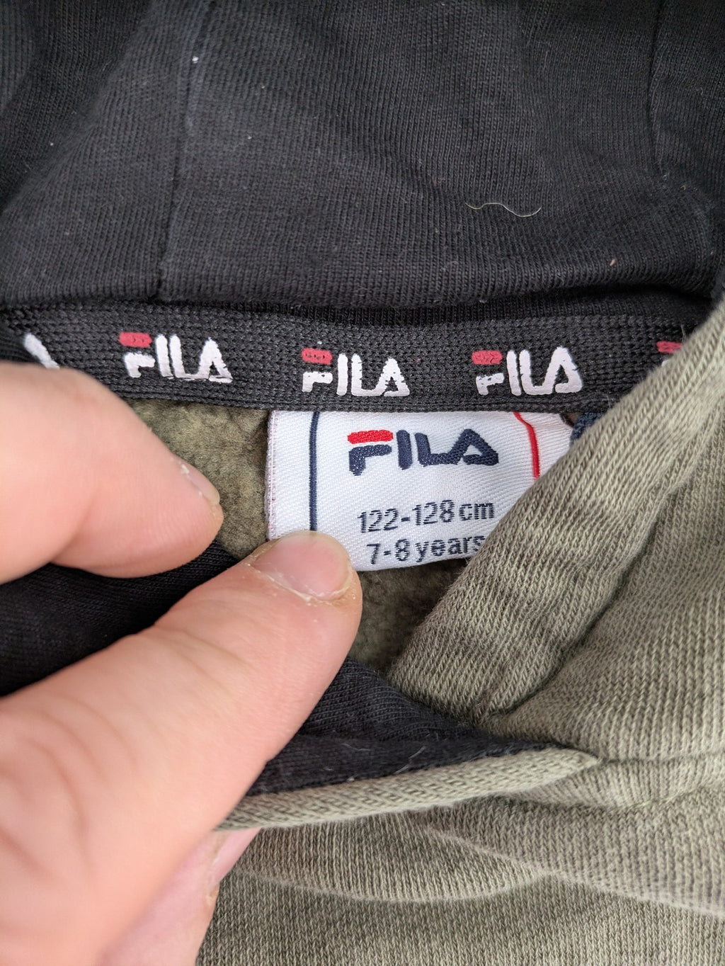 Fila turtle neck jumper khaki with large white logo and kangaroo pocket.