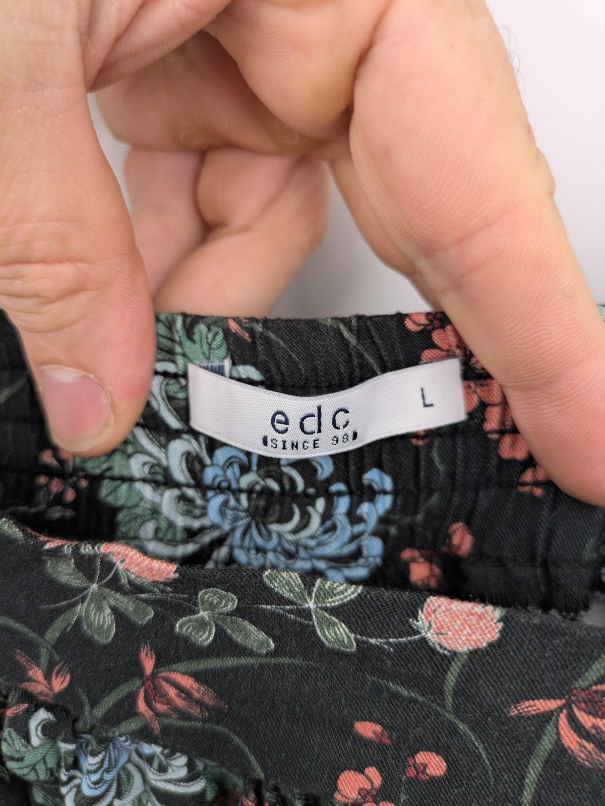 edc multi jumpsuit floral pattern sleeveless with smocked waist and spaghetti straps