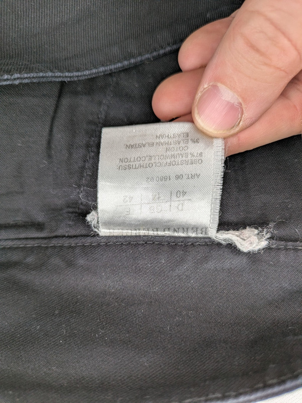 Bernd Berger grey chino pants with double button closure and straight leg design.