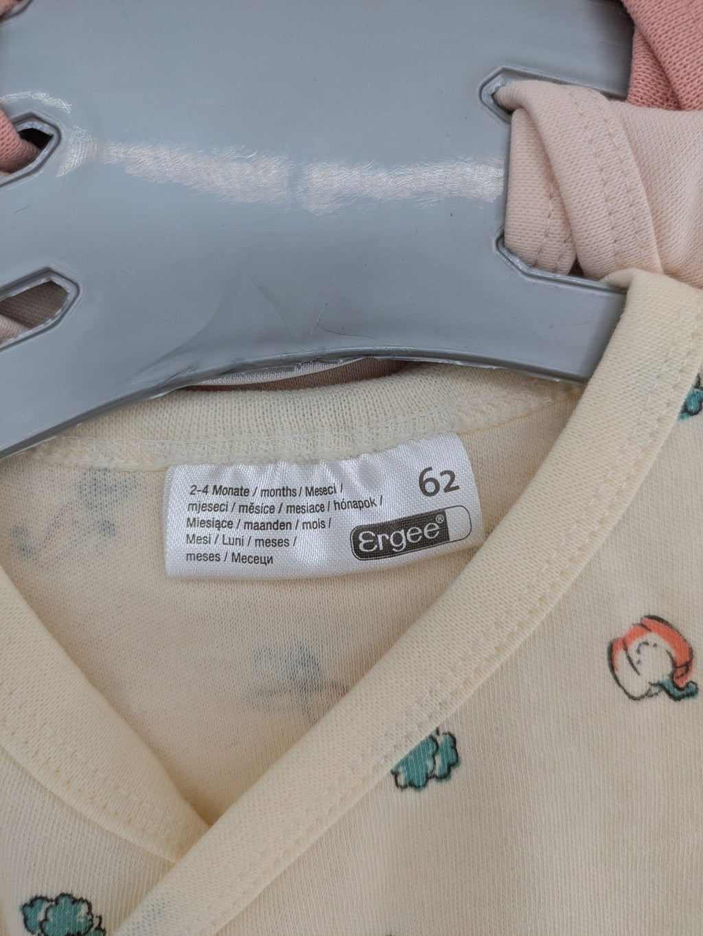 Ergee baby bodysuits set blue cream orange various cute patterns and wrap design.