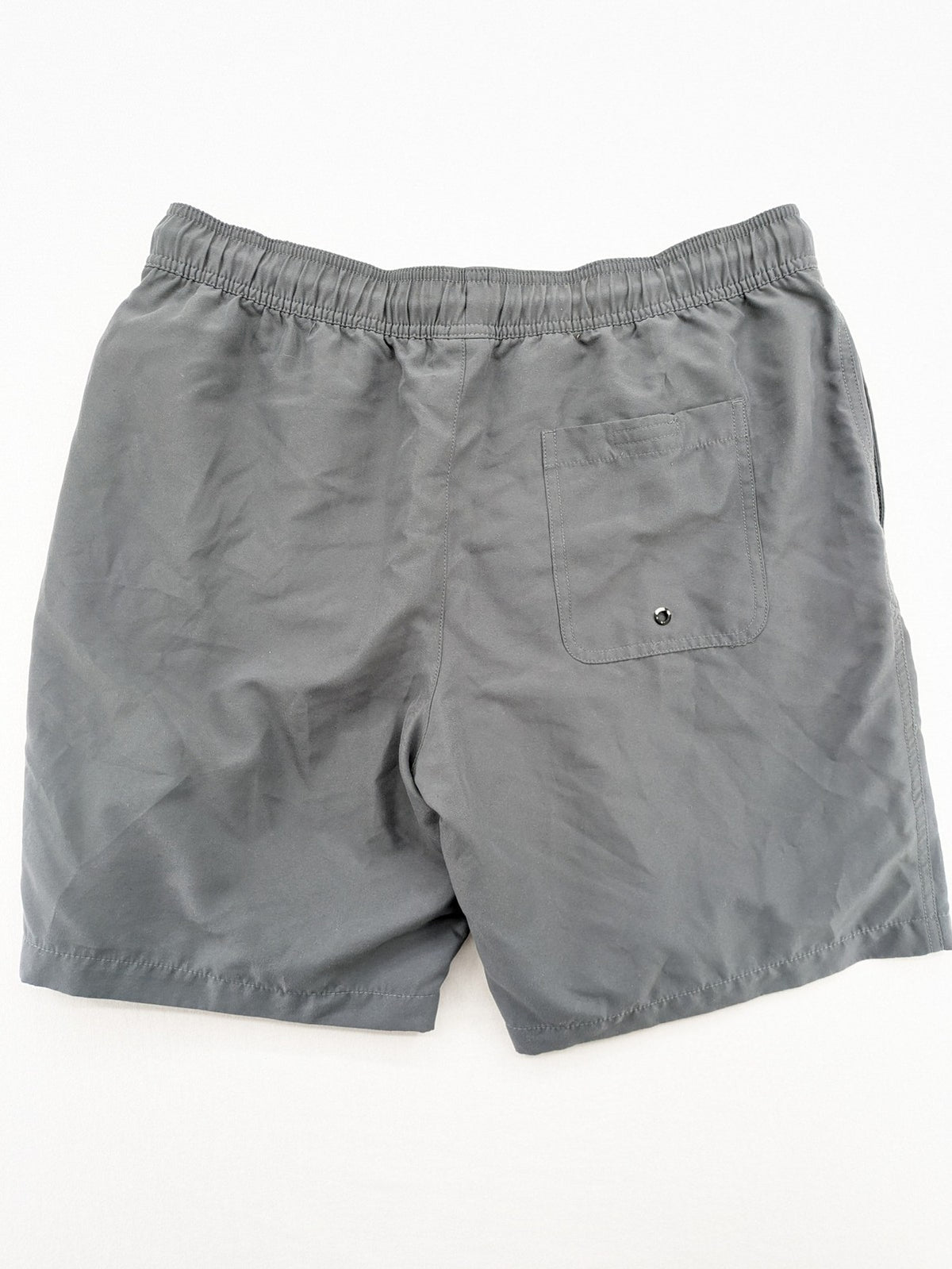 Amazon Essentials grey swim shorts with adjustable drawstring, side pockets, and quick-dry material.