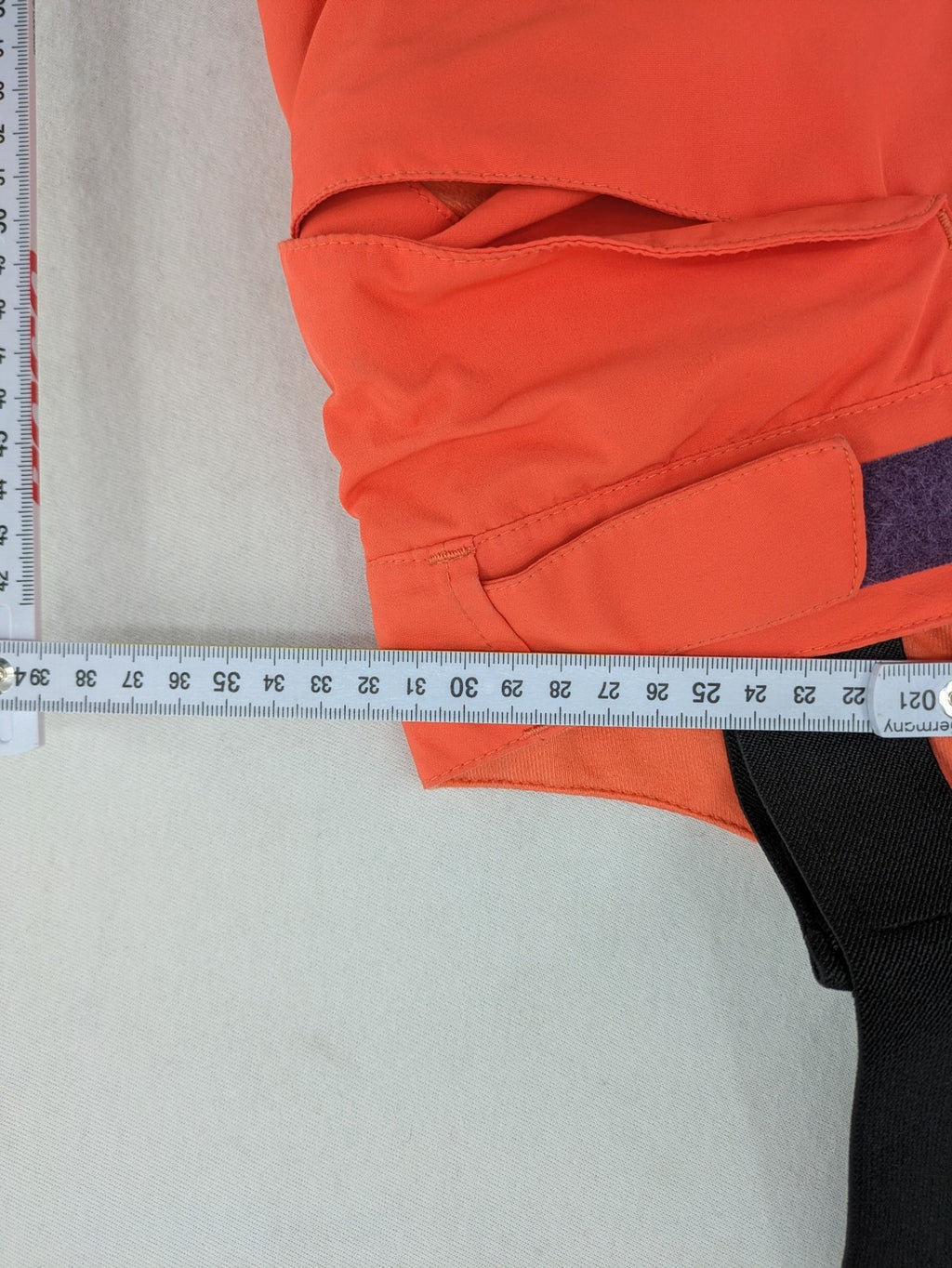Vaude orange ski pants with logo, Primaloft insulation, and Ceplex Active membrane.