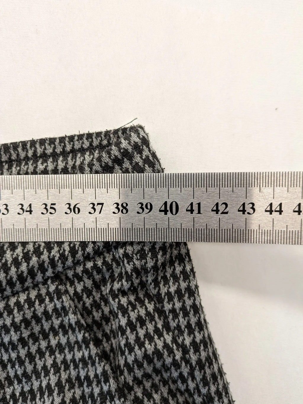 UP2FASHION beige and brown houndstooth pants with adjustable drawstring and soft stretch material.