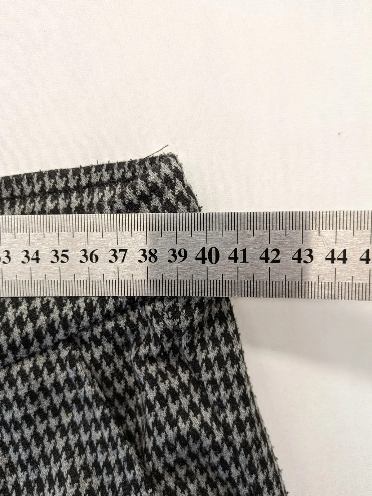 UP2FASHION beige and brown houndstooth pants with adjustable drawstring and soft stretch material.