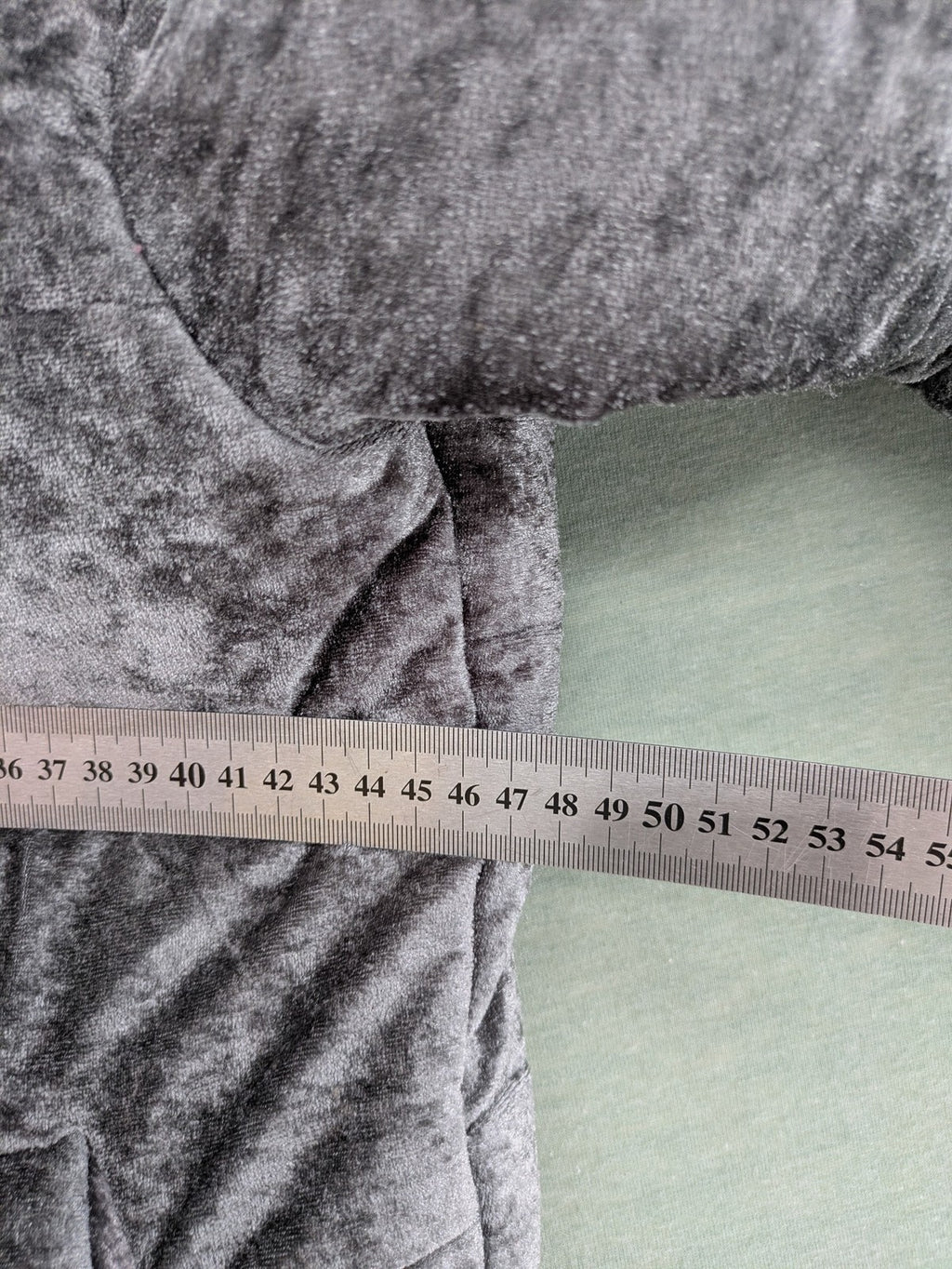 Periot grey puffer jacket with high collar and O-ring zipper detail in velvet texture.