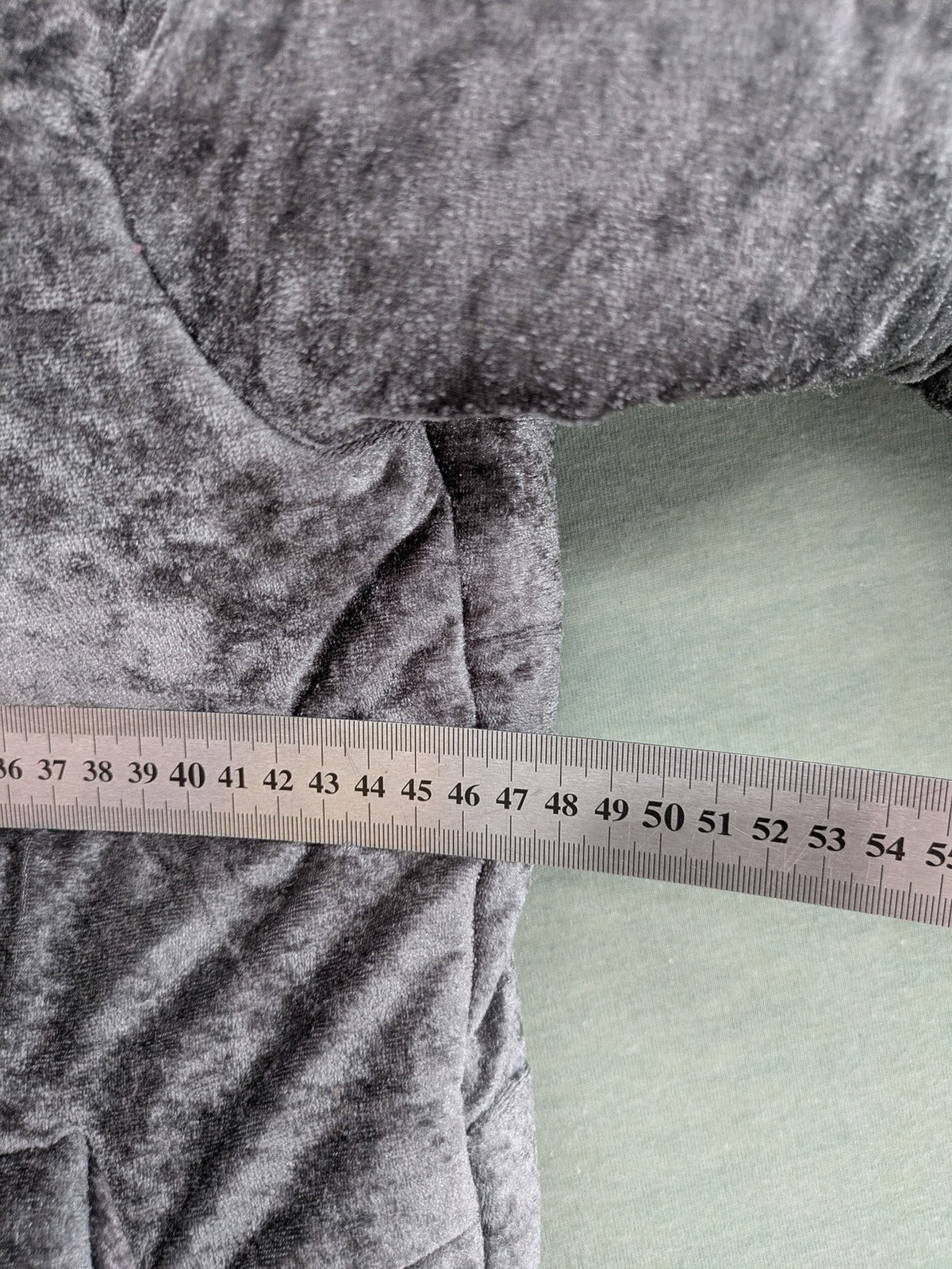 Periot grey puffer jacket with high collar and O-ring zipper detail in velvet texture.