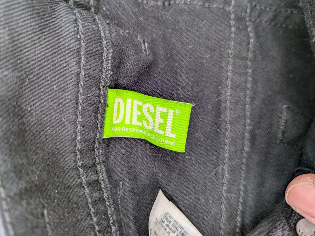 Diesel black Thommer Slim jeans with classic 5-pocket design and stretch material.