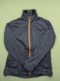 Cross Sportswear orange golf jacket with full zip, high collar, and contrast zipper details.