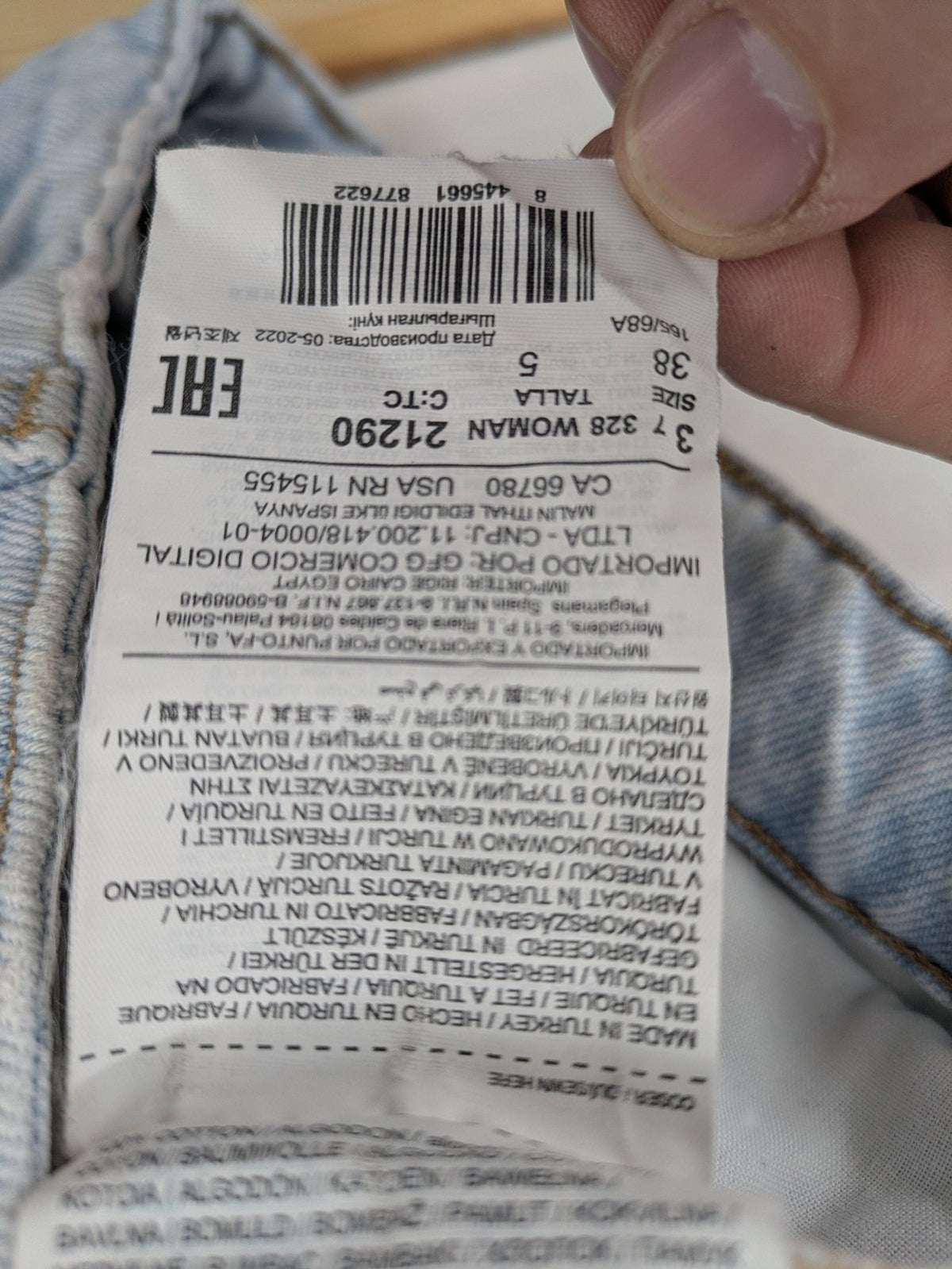 MNG blue high waist mom jeans with raw hem and five-pocket style.