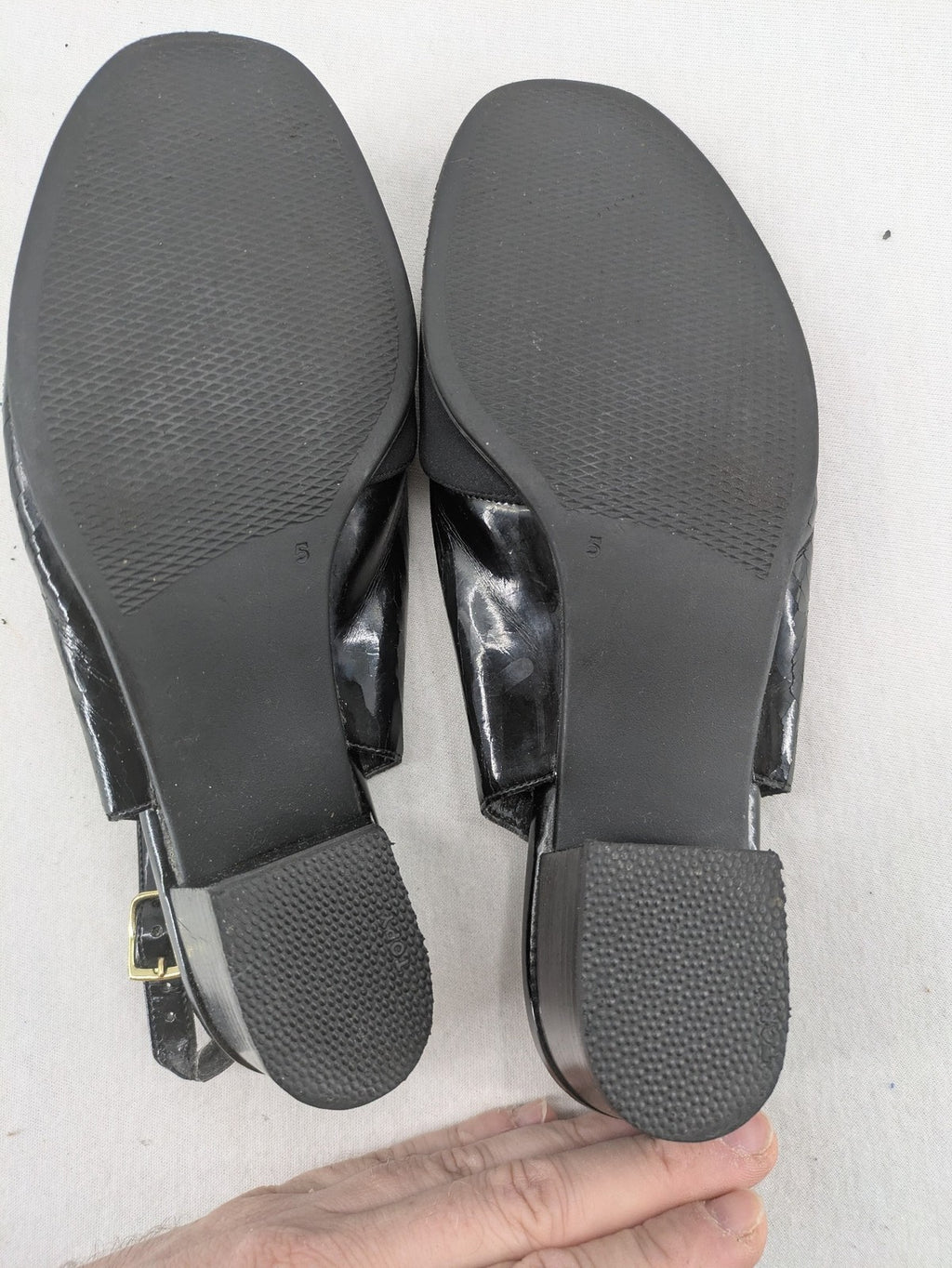 Jenny by Ara black slingback pumps with peep-toe front and glossy finish.