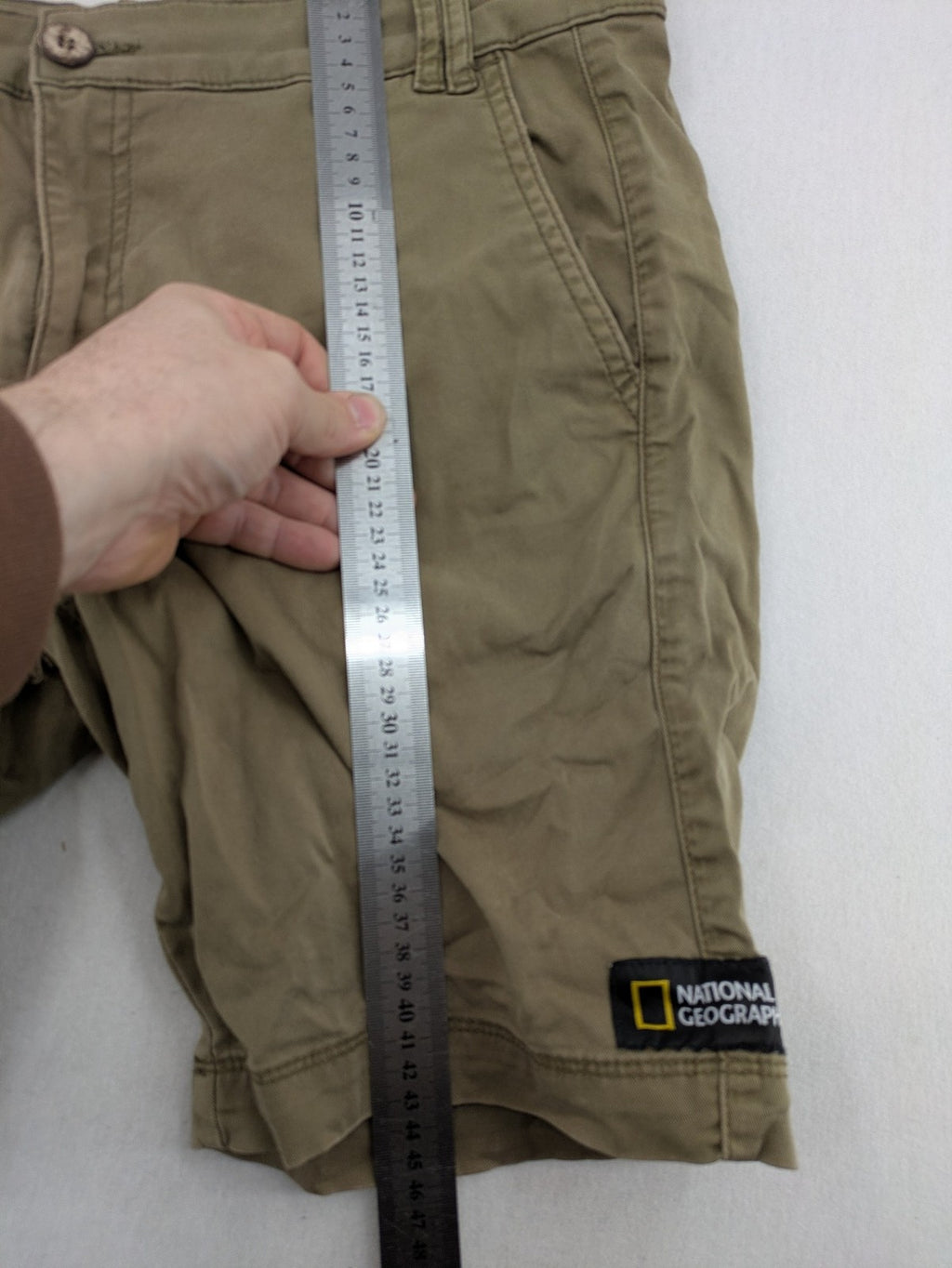 National Geographic khaki shorts flat front design with subtle logo patch