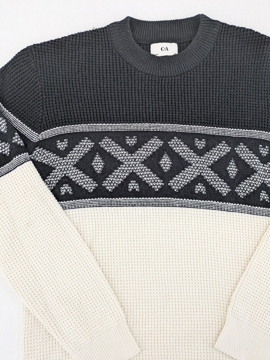 C&A turtle neck jumper black cream with Nordic pattern and waffle knit texture.