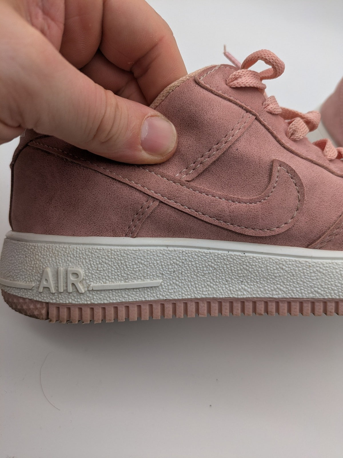 Nike Air Force 1 Low Top pink suede with perforated toe box and white sole