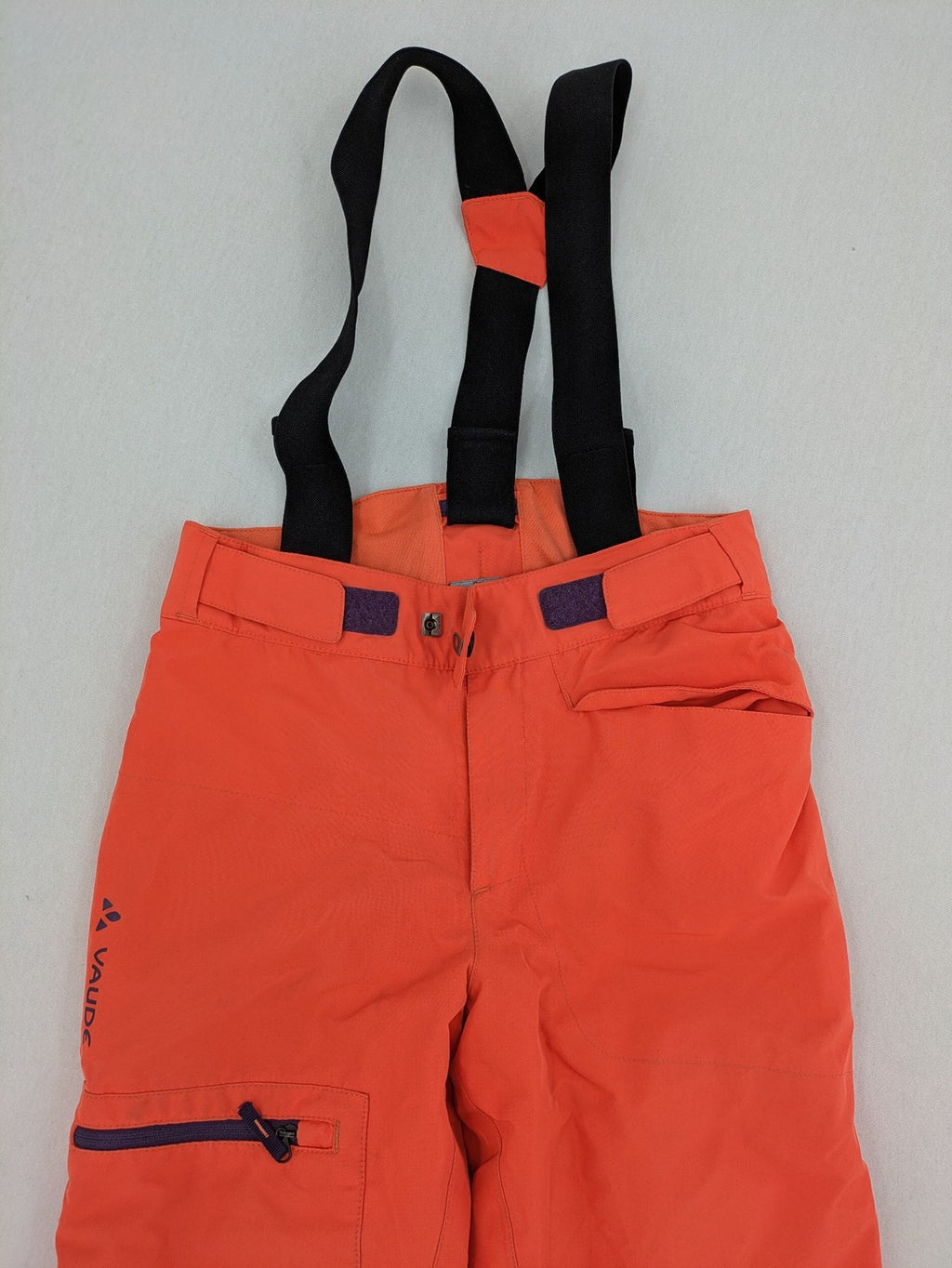 Vaude orange ski pants with logo, Primaloft insulation, and Ceplex Active membrane.