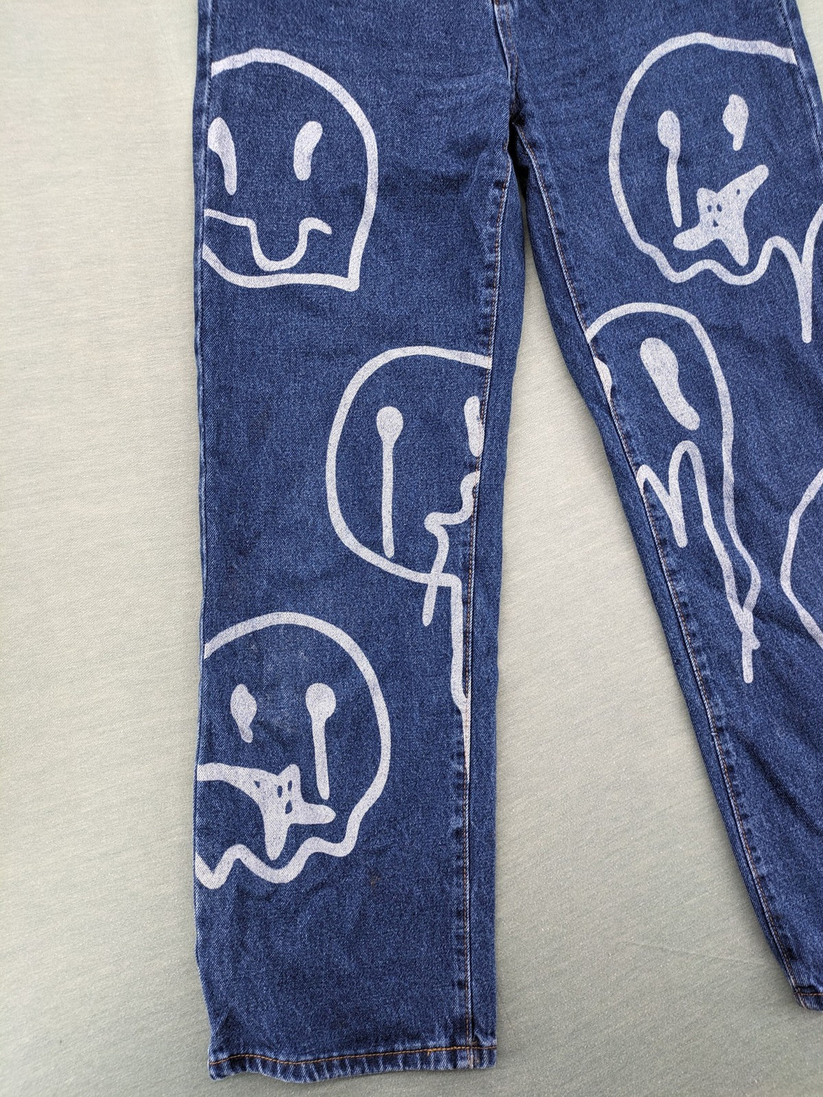 SHEIN blue wide-leg jeans high waist with white smiley face graphics and classic 5-pocket design.