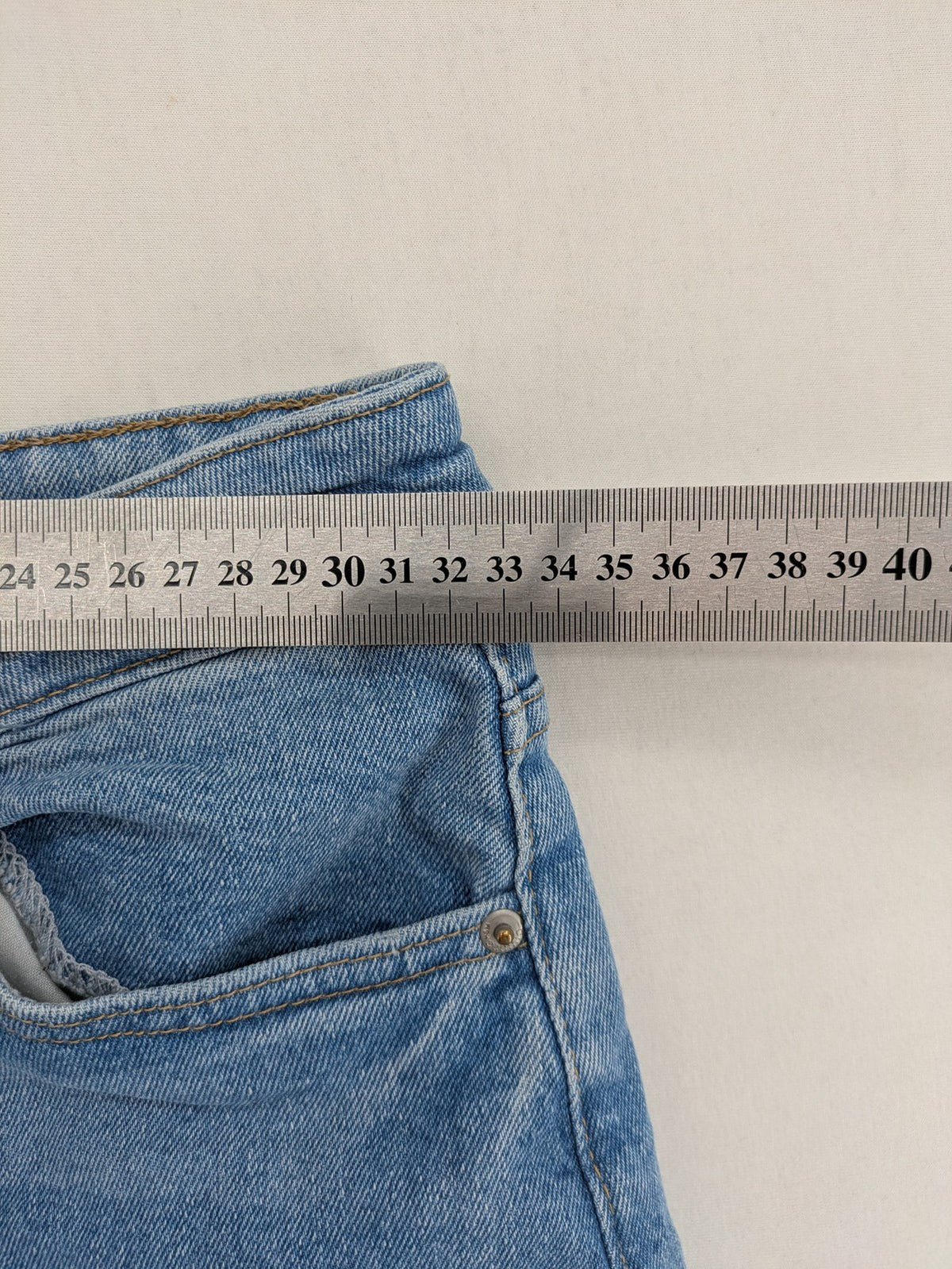 H&M Divided blue mom jeans high waist tapered fit with classic wash and durable cotton blend.