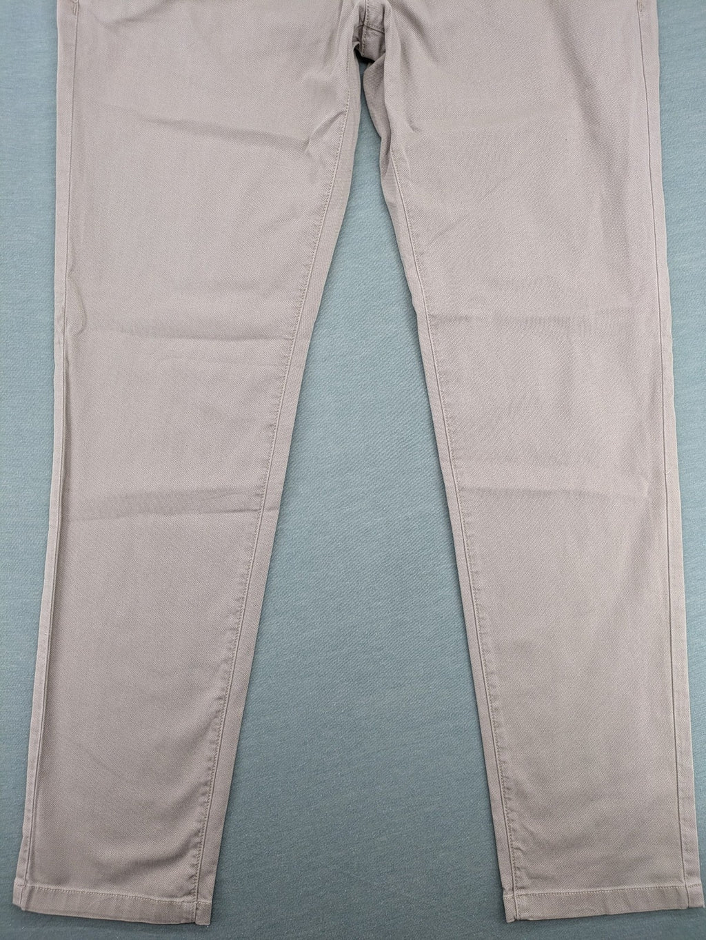 Marc O'Polo beige tapered fit chino pants, soft cotton stretch fabric, modern silhouette.