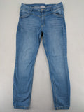 Janina blue skinny fit jeggings with elastic waistband and angled front pockets.