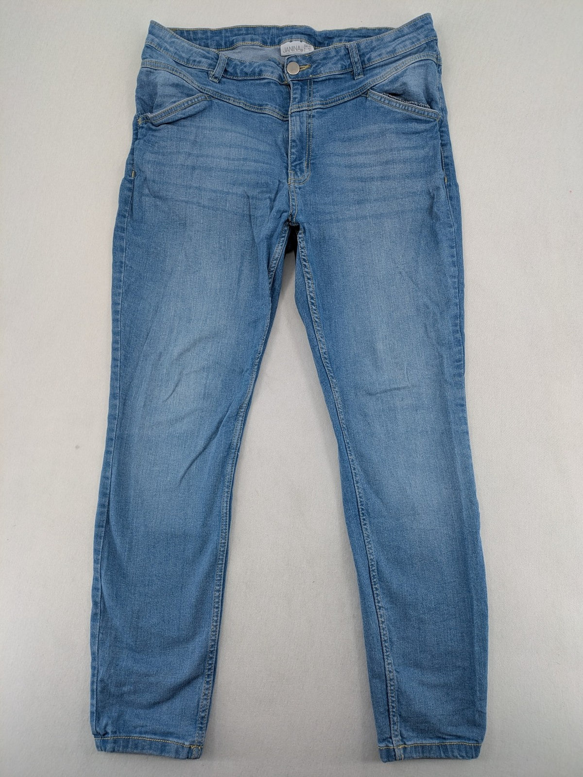 Janina blue skinny fit jeggings with elastic waistband and angled front pockets.
