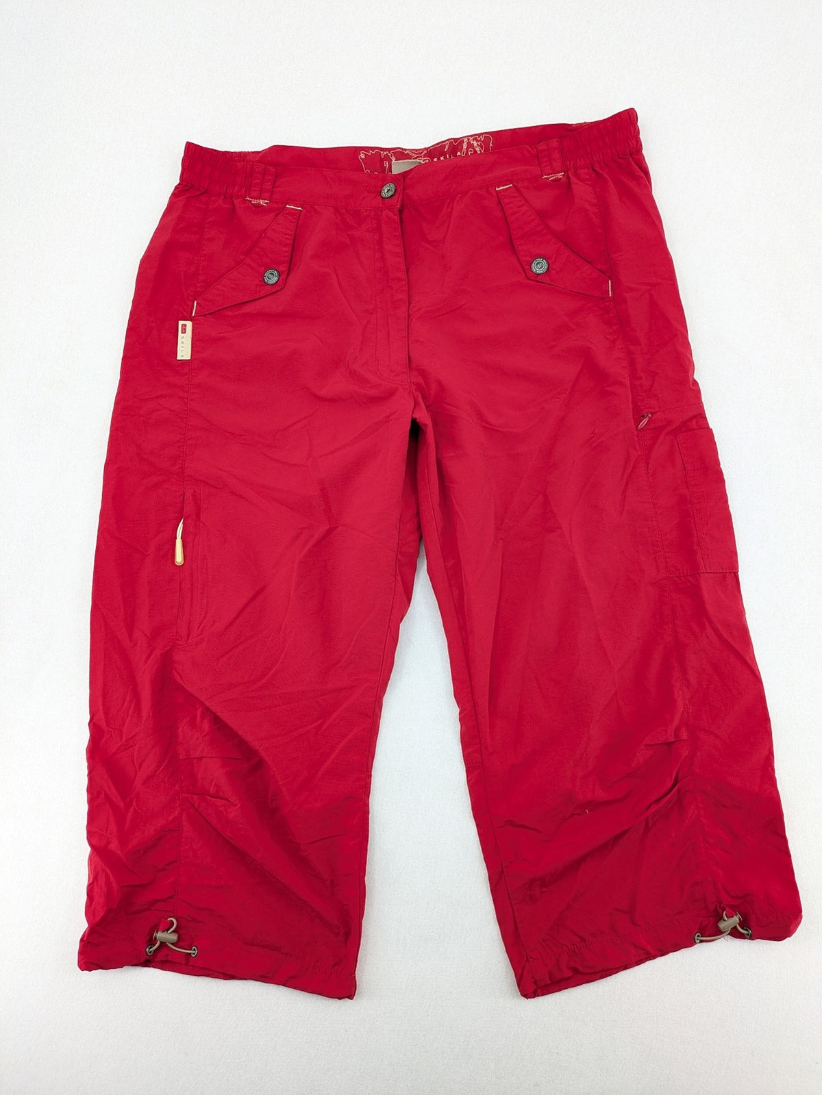 Skila red outdoor capri pants lightweight polyamide with adjustable drawstrings and pockets.
