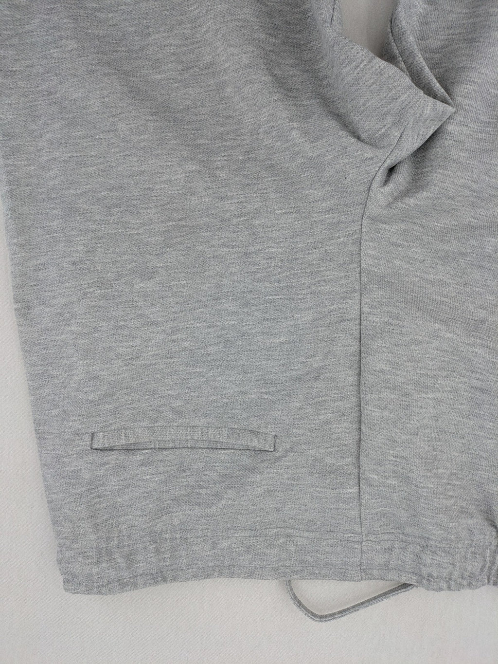 C&A grey sweatpants with elastic waistband, adjustable drawstring, and side pockets.