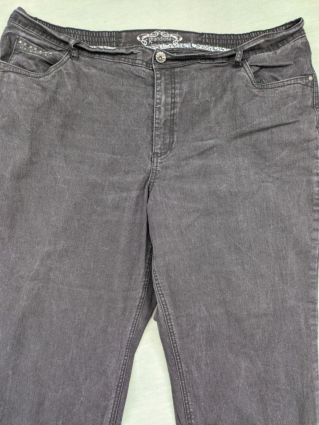 Charles Vögele grey straight jeans with elastic waistband and decorative studs on pockets.