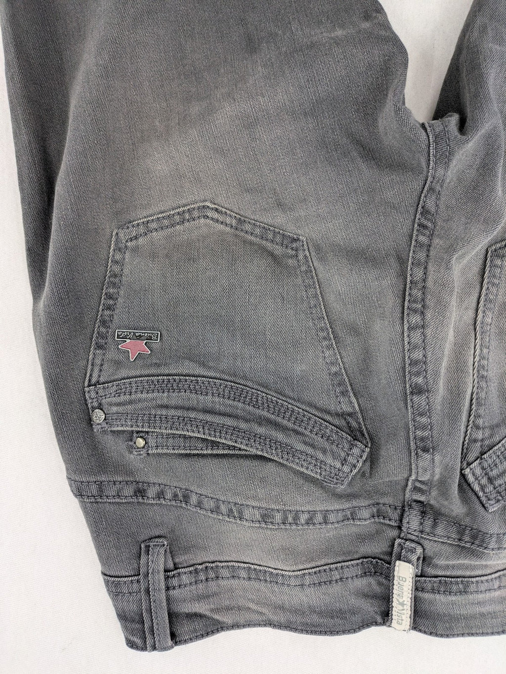 Buena Vista grey skinny jeans with button fly and stretch denim material.