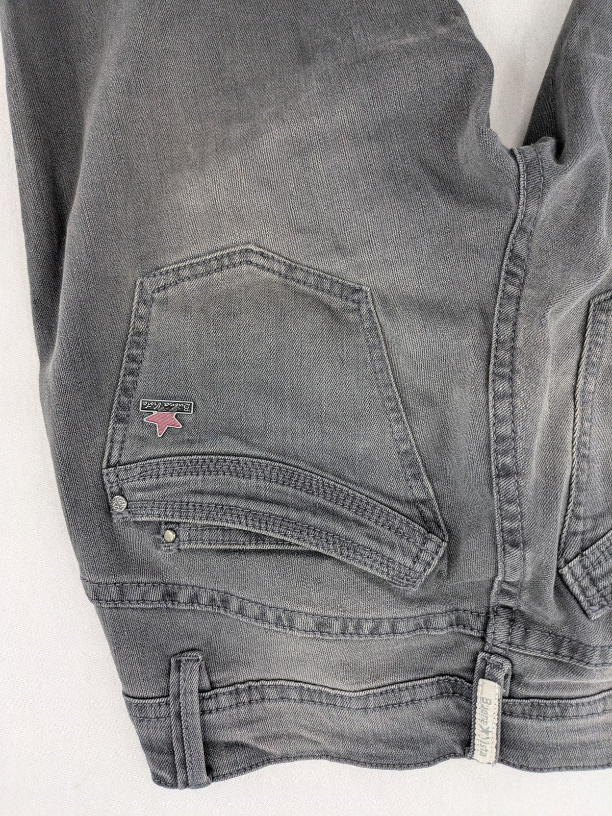Buena Vista grey skinny jeans with button fly and stretch denim material.