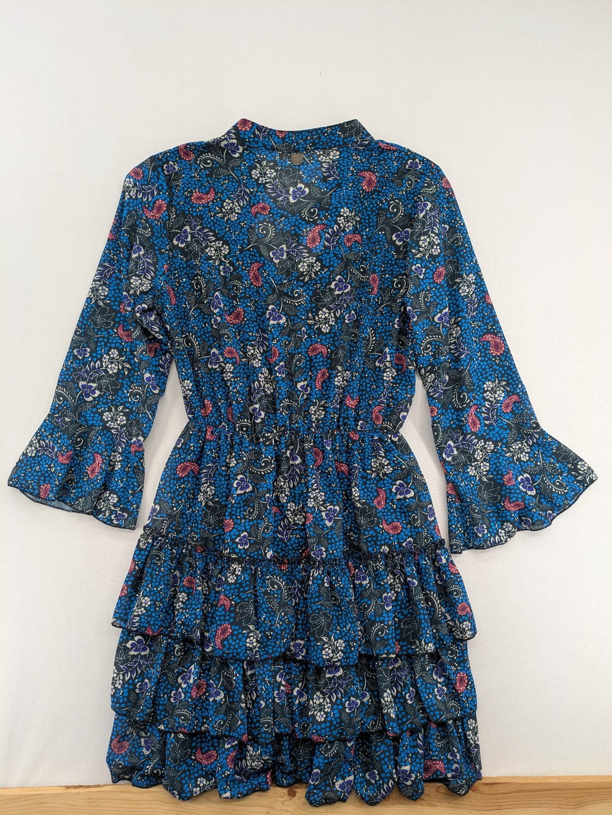 BSB multi-coloured bridal party dress with floral paisley pattern and ruffled hem.