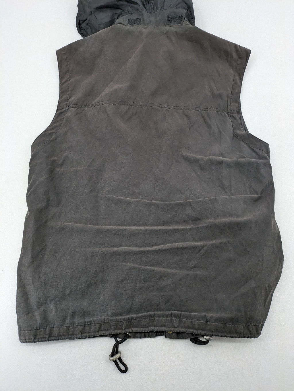 Barisal grey coat with hood, cargo pockets, and checkered lining detail.