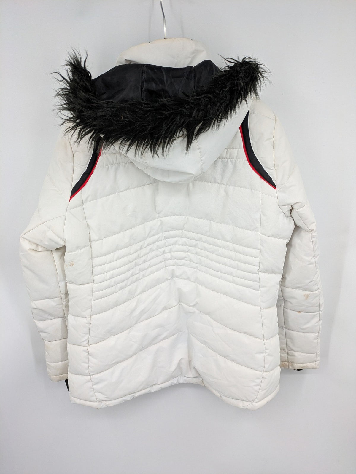 Janina white puffer jacket with quilted design and faux fur hood accents.