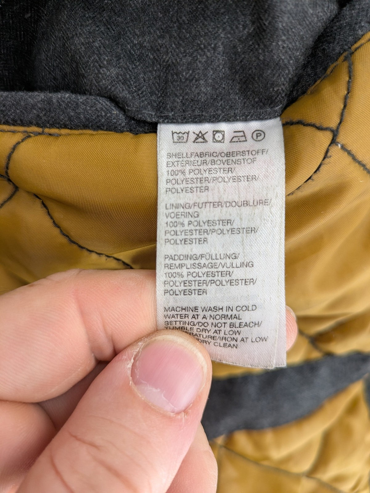 Rover & Lakes grey jacket with hood, quilted lining, and multiple pockets.