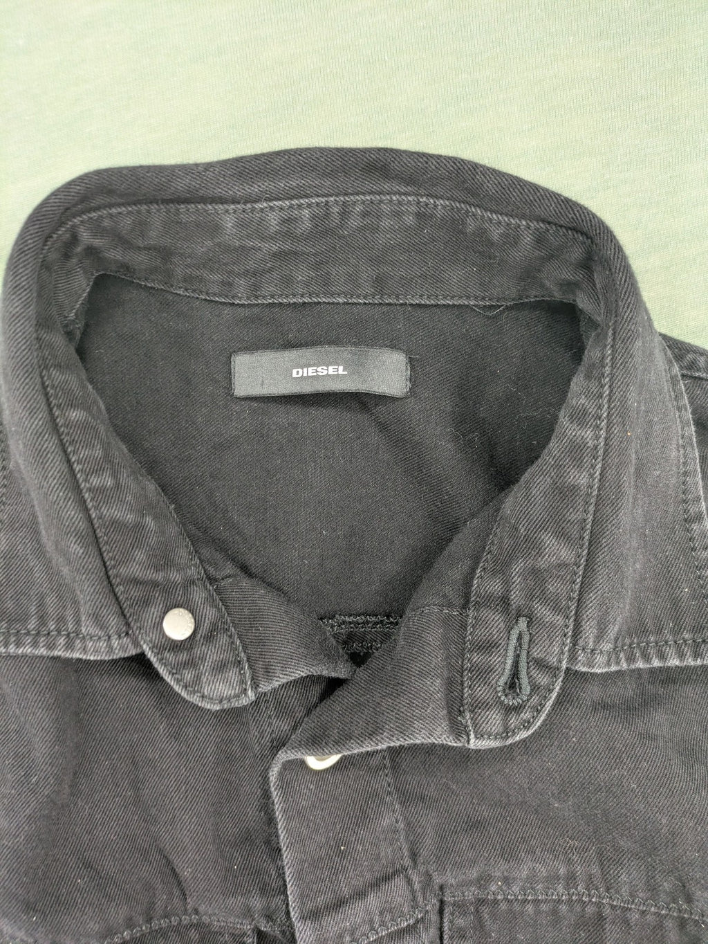 Diesel grey tunic top with denim front, pleated chiffon back, and D-ring detail.