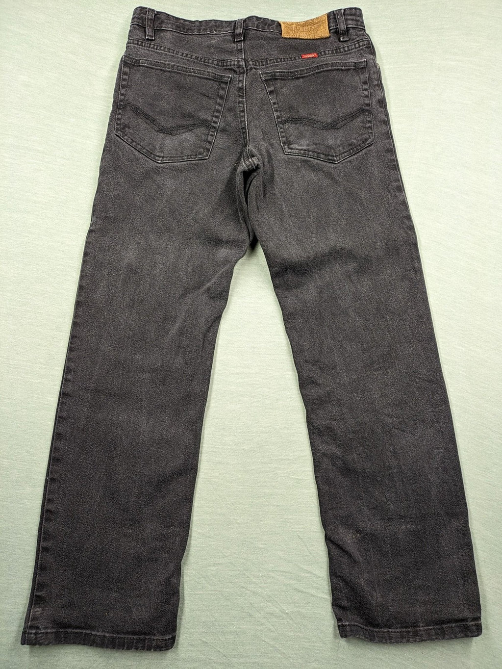 Hero by John Meddox black straight jeans with faded wash and durable cotton-stretch material.