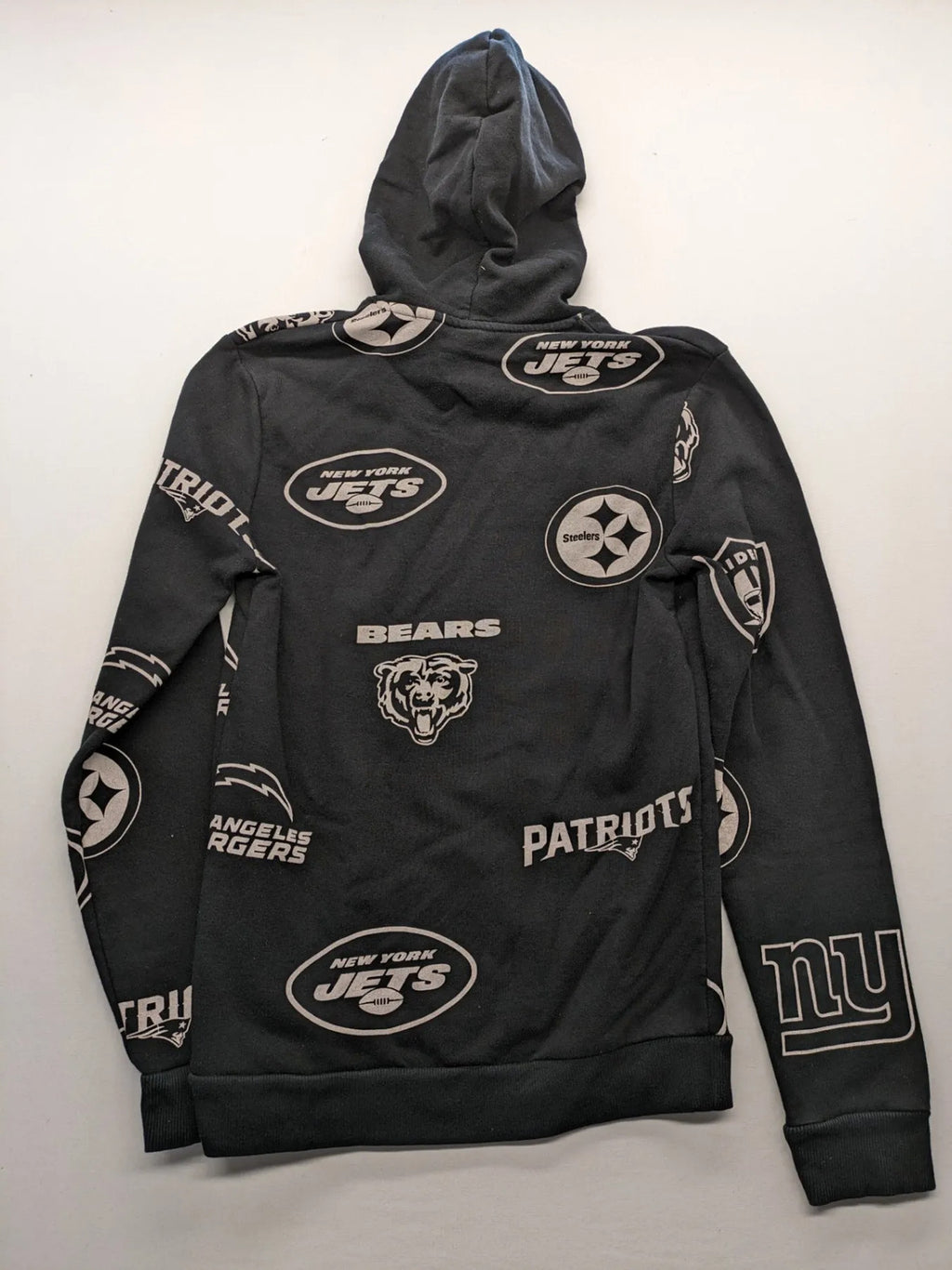 NFL black hoodie all-over team logo print, adjustable hood, cotton blend material.