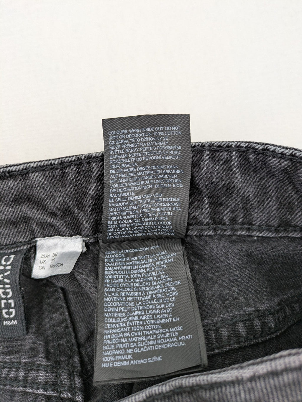 H&M Divided black straight jeans with allover rhinestone embellishments and classic five-pocket design.