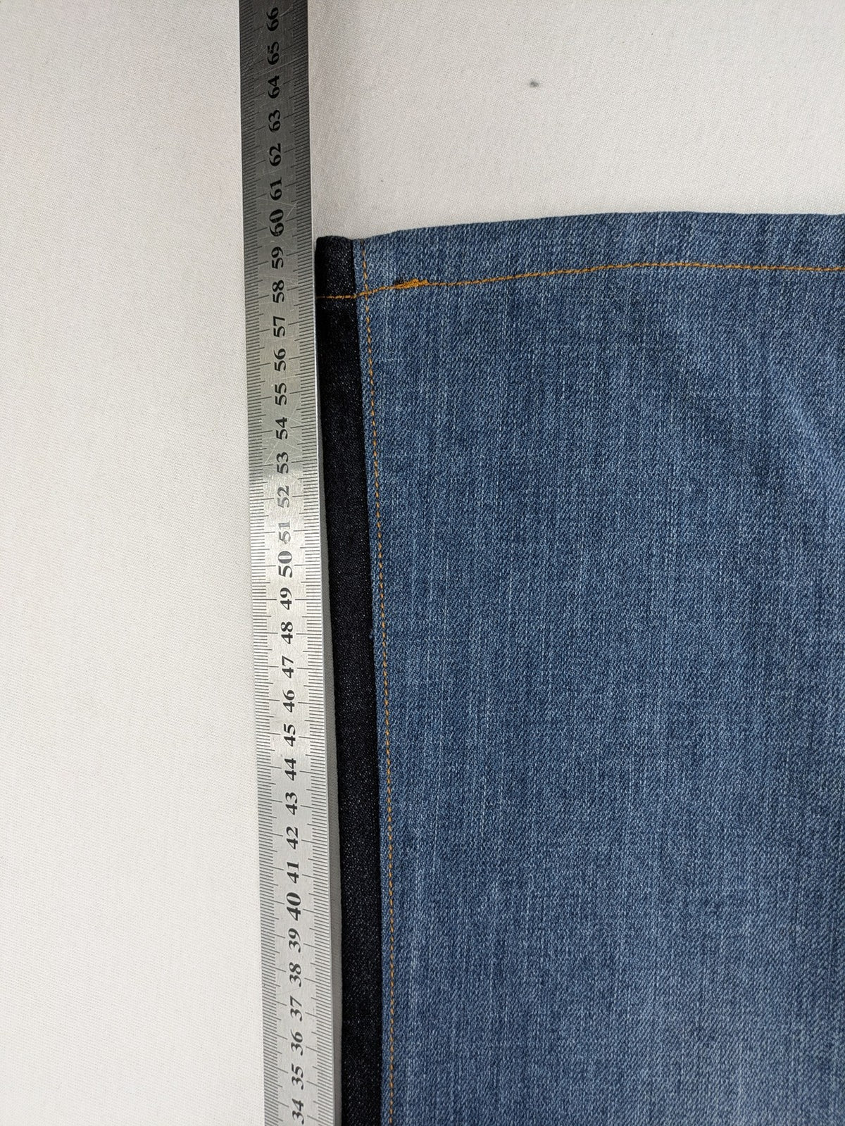 Funky Staff two-tone straight jeans black and blue, colorblock design, embroidered logo on back pocket.