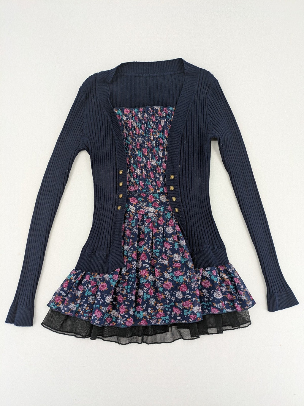 Damen turtle neck jumper dark blue floral ribbed knit with delicate lace hem.