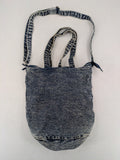 Clockhouse blue acid wash denim tote bag with adjustable shoulder strap and classic handles.
